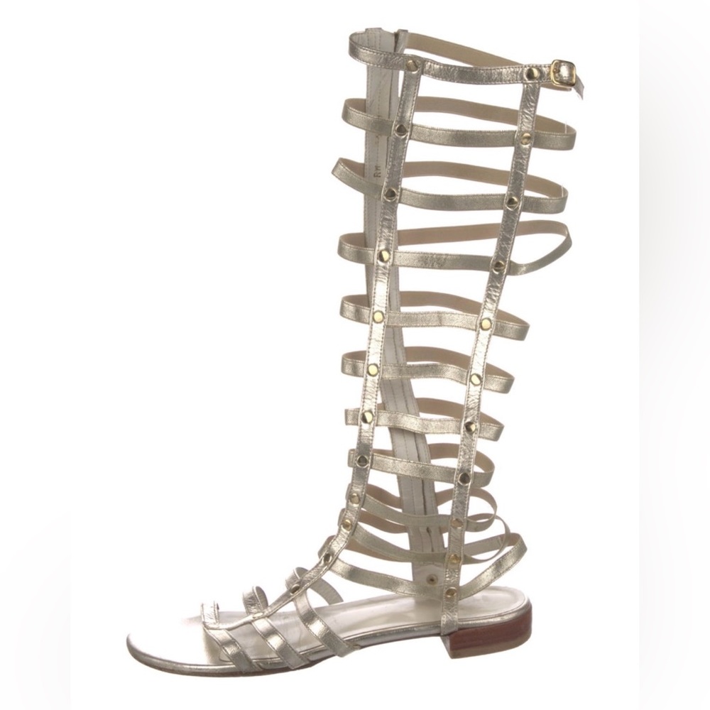 Stuart Weitzman Leather Gladiator Sandals
Gold W/studs excellent condition 8.5